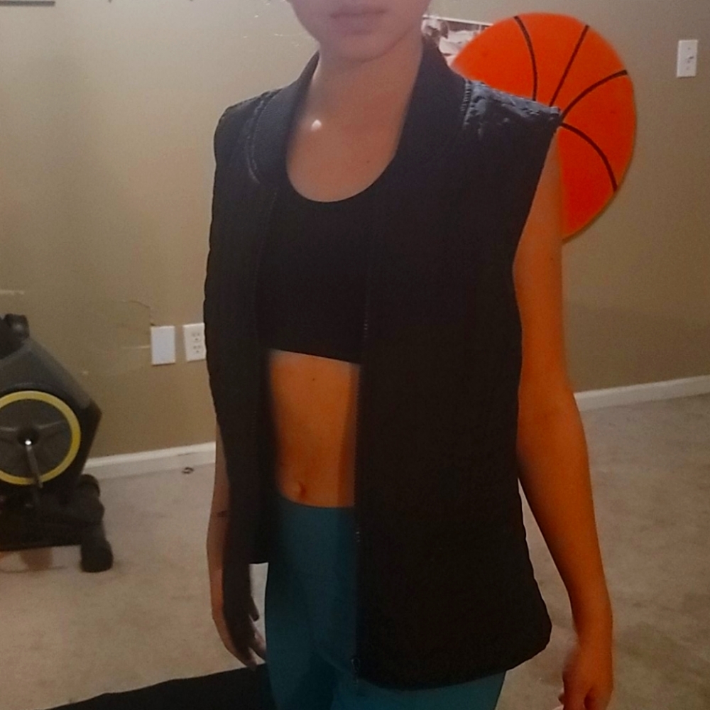 Limited black pleated vest